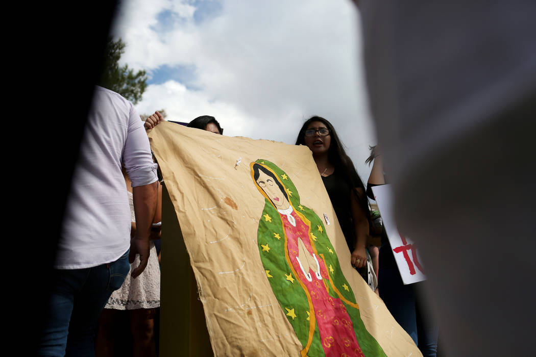 Individuals join in with high school students that organized a rally in support of the DREAM Act, at Rancho high school in Las Vegas, Wednesday, Sept. 13, 207. Elizabeth Brumley Las Vegas Review-J ...