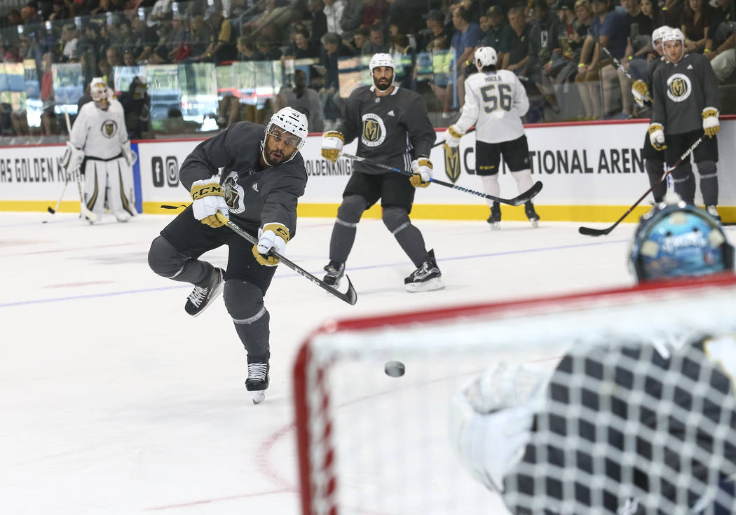 Vegas Golden Knights left wing Pierre-Edouard Bellemare (41) shoots a goaltender Dylan Ferguson (1) in a drill during the NHL team's practice at the City National Arena in Las Vegas, Saturday, Sep ...