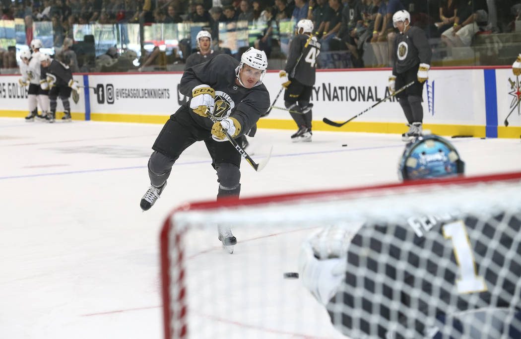 Vegas Golden Knights forward Stephen MacAulay (93) shoots a goaltender Dylan Ferguson (1) in a drill during the NHL team's practice at the City National Arena in Las Vegas, Saturday, Sept. 16, 201 ...
