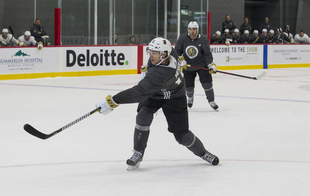 Vegas Golden Knights left defenseman Jon Merrill (15) takes a shot during a scrimmage game during the NHL team's practice at the City National Arena in Las Vegas, Saturday, Sept. 16, 2017. Richard ...