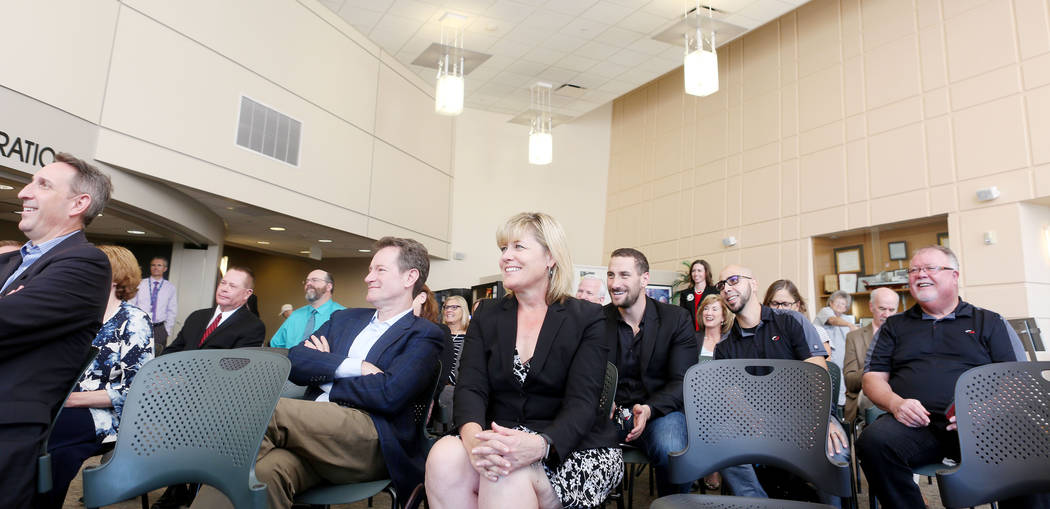 Individuals watch a demonstration of the new Telehealth technology during the Nevada Hospital Association's and the technology company Switch's announcement of the Nevada Broadband Telemedicine In ...