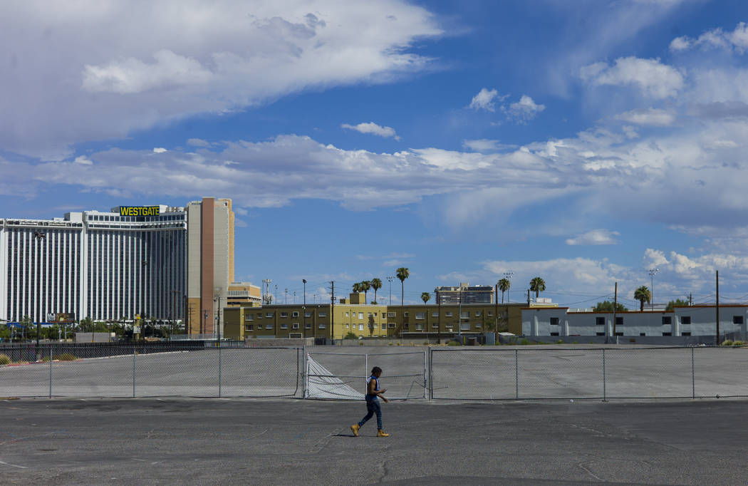 A man walks by a vacant lot just north of the Peppermill along the north Strip area in Las Vegas on Wednesday, Sept. 13, 2017. Chase Stevens Las Vegas Review-Journal @csstevensphoto