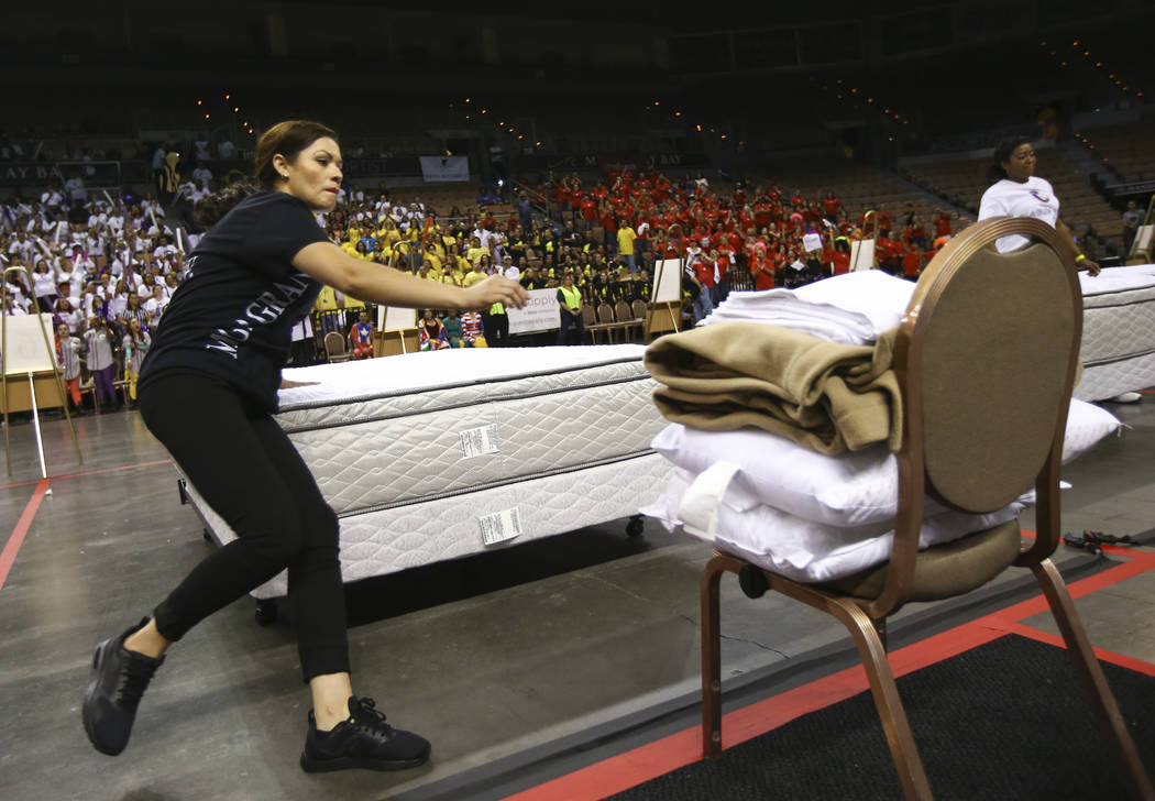 Leticia Bertin of the MGM Grand competes in the bed-making event during the Housekeeping Olympics at the Mandalay Bay Events Center in Las Vegas on Wednesday, Sept. 13, 2017. The competition drew  ...