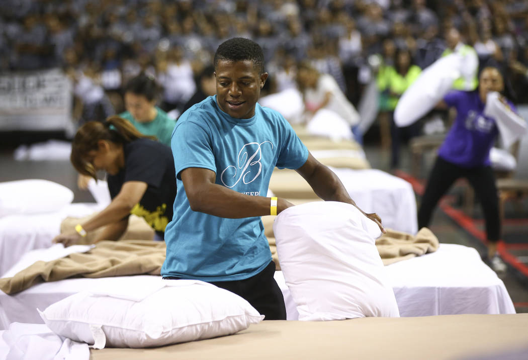 Bobby Henderson of the Bellagio competes in the bed-making event during the Housekeeping Olympics at the Mandalay Bay Events Center in Las Vegas on Wednesday, Sept. 13, 2017. The competition drew  ...