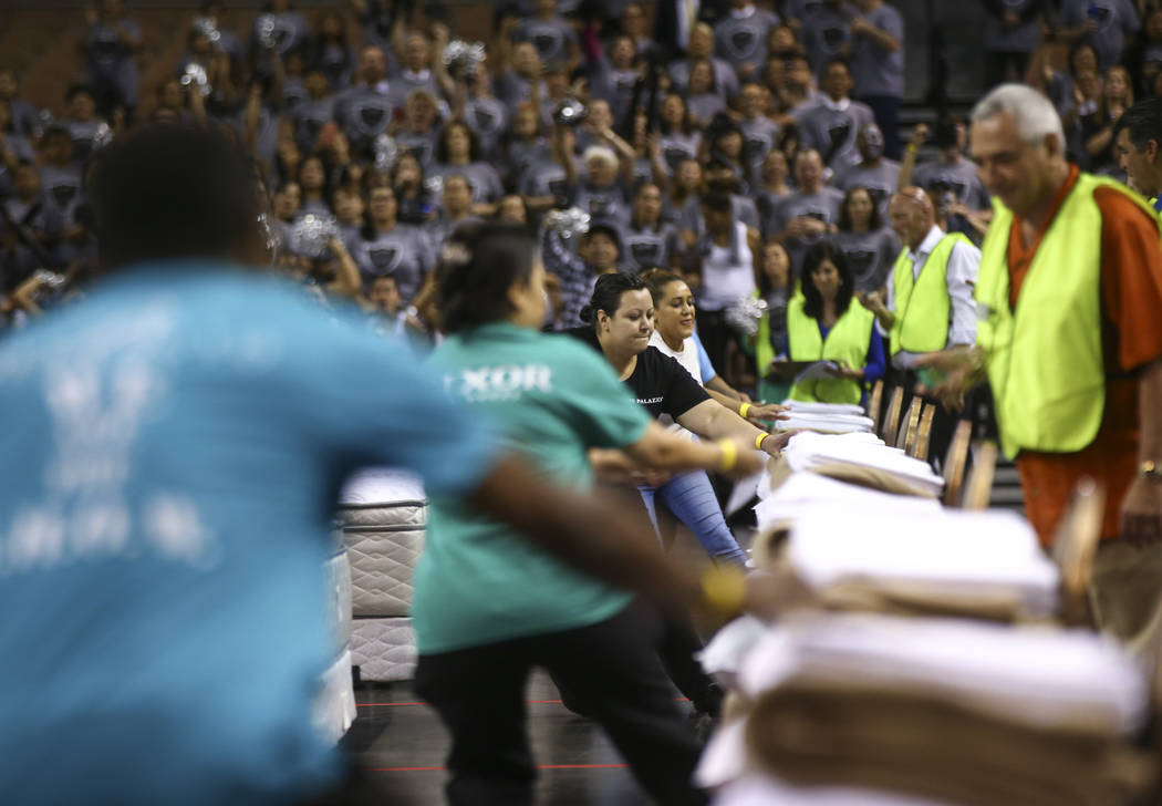 Competitors during the bed-making event as part of the Housekeeping Olympics at the Mandalay Bay Events Center in Las Vegas on Wednesday, Sept. 13, 2017. The competition drew teams from 17 differe ...