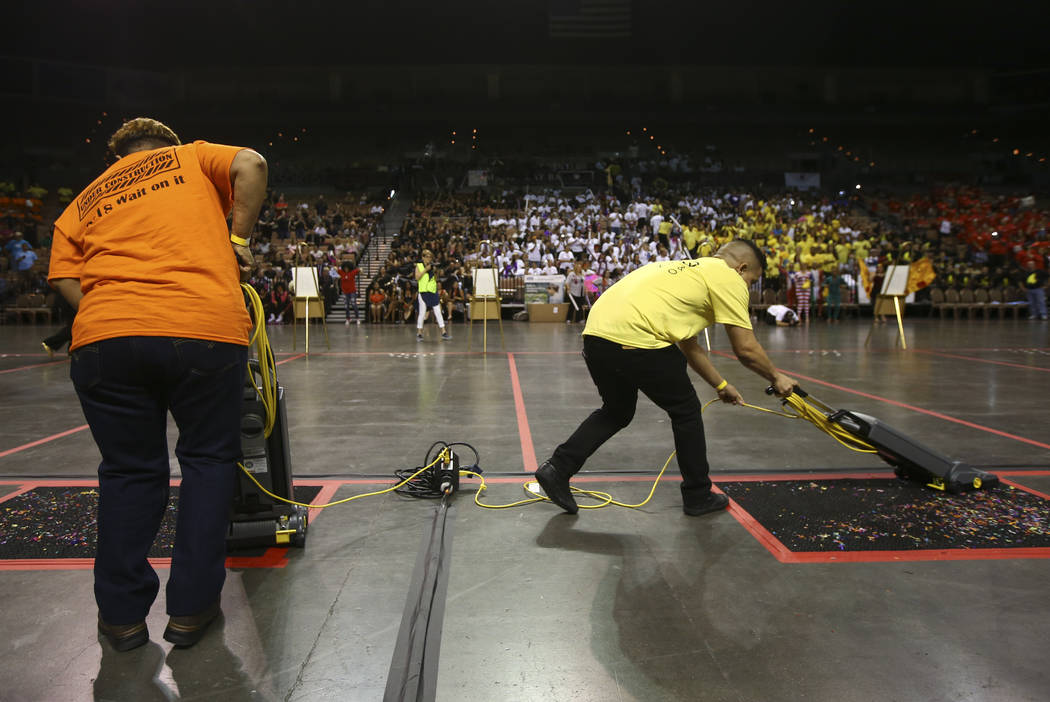 Yondy Moya of The Linq Hotel, right, during the vacuuming competition as part of the Housekeeping Olympics at the Mandalay Bay Events Center in Las Vegas on Wednesday, Sept. 13, 2017. The competit ...
