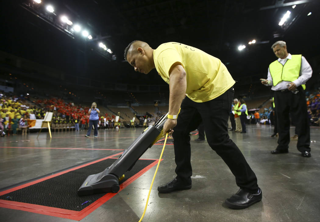 Yondy Moya of The Linq Hotel during the vacuuming competition as part of the Housekeeping Olympics at the Mandalay Bay Events Center in Las Vegas on Wednesday, Sept. 13, 2017. The competition drew ...