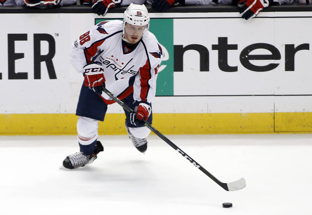 Washington Capitals defenseman Nate Schmidt (88) controls the puck against the Anaheim Ducks during the third period of an NHL hockey game in Anaheim, Calif., Sunday, March 12, 2017. The Ducks won ...