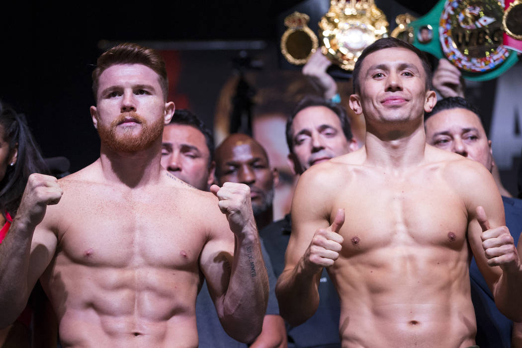 Saul "Canelo" Alvarez, left, and Gennady "GGG" Golovkin during a weigh-in event at MGM Grand Garden Arena in Las Vegas, Friday, Sept. 15, 2017. Alvarez and Golo ...