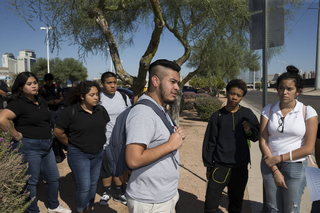Anthony Ramirez, 17, center, student concerned about budget cuts at Burk Horizon High School, is interviewed outside of his school in Las Vegas, Wednesday, Sept. 20, 2017. The school is facing bud ...