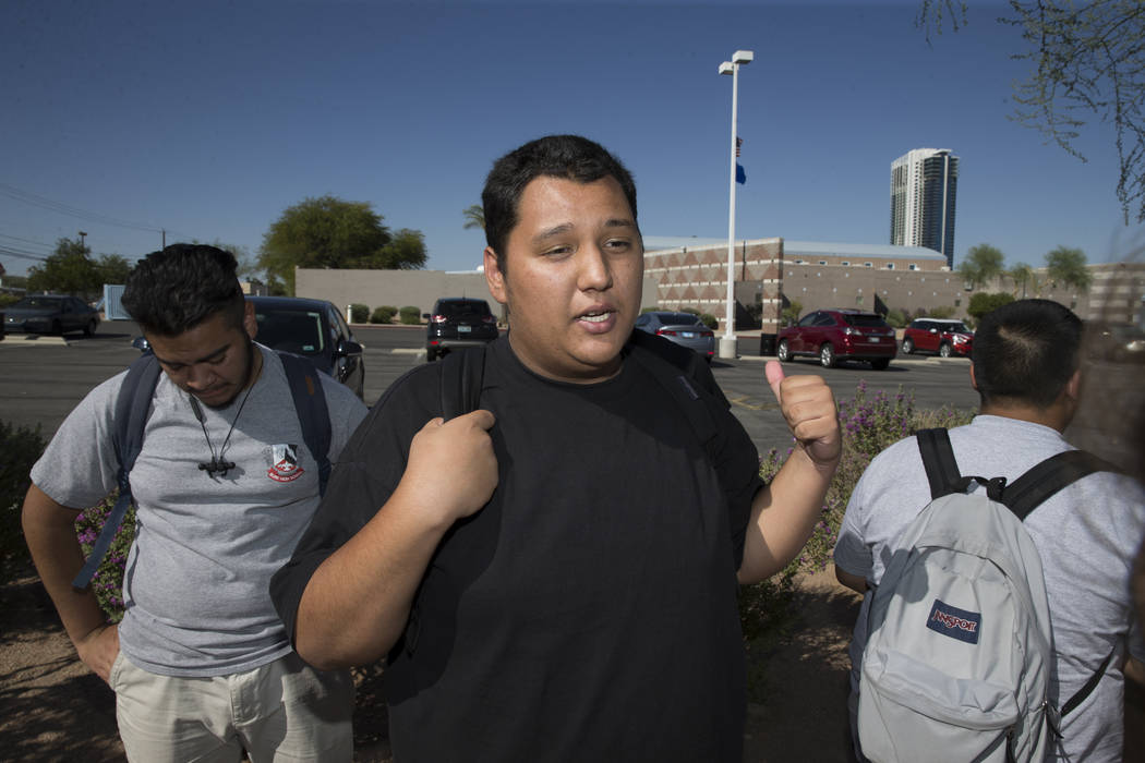 Trace Del Pino, 18, student concerned about budget cuts at Burk Horizon High School, is interviewed outside of his school in Las Vegas, Wednesday, Sept. 20, 2017. The school is facing budget cuts  ...