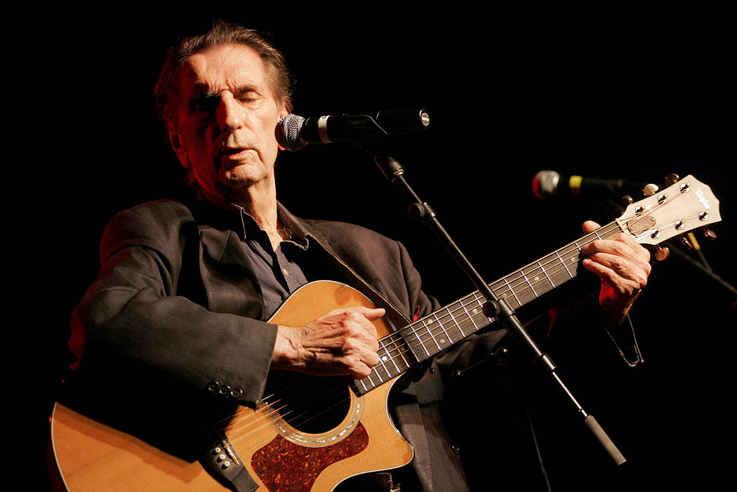 Harry Dean Stanton performs at the 35th anniversary celebration of the founding of Greenpeace, in Los Angeles in 2006. (AP Photo/Jae C. Hong, File)