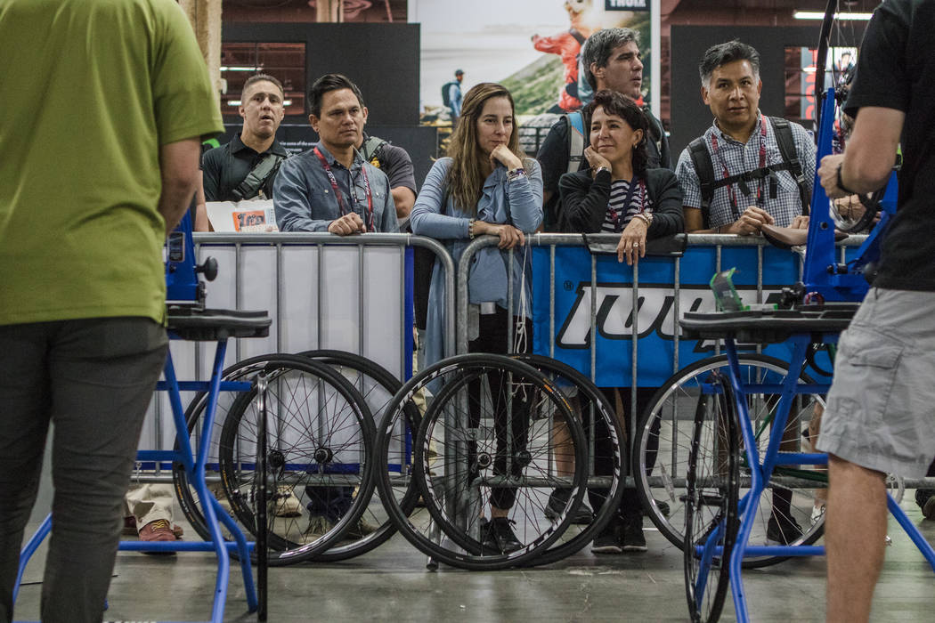 Spectators watch a mechanical bike challenge at the  Interbike International Expo at Mandalay Bay Convention Center on Wednesday, Sep. 20, 2017, in Las Vegas. Morgan Lieberman Las Vegas Review-Journal