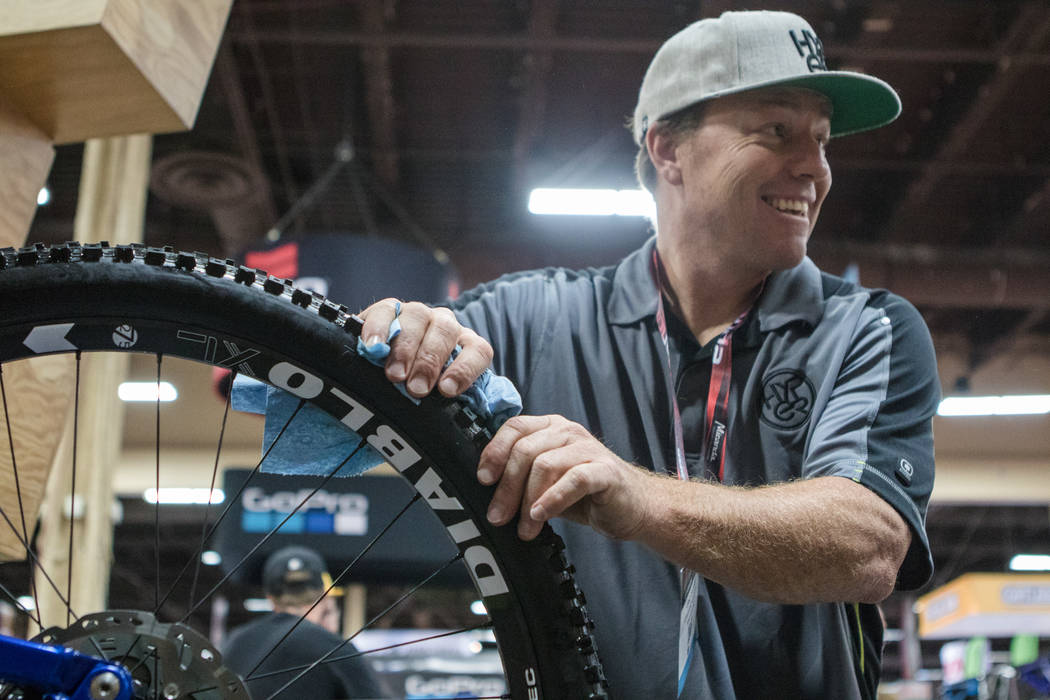 California resident Eric Carter oils a bike tire at the Nitro Circus booth at Interbike International Expo at Mandalay Bay Convention Center on Wednesday, Sep. 20, 2017, in Las Vegas. Morgan Liebe ...