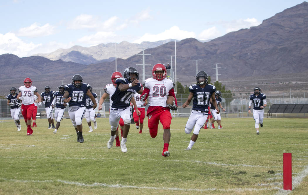 Arbor View's Jaquari Hannie (20) approaches the end zone for a touchdown against Shadow Ridge during a football game at Shadow Ridge High School on Saturday, Sept. 23, 2017, in Las Vegas. Richard  ...