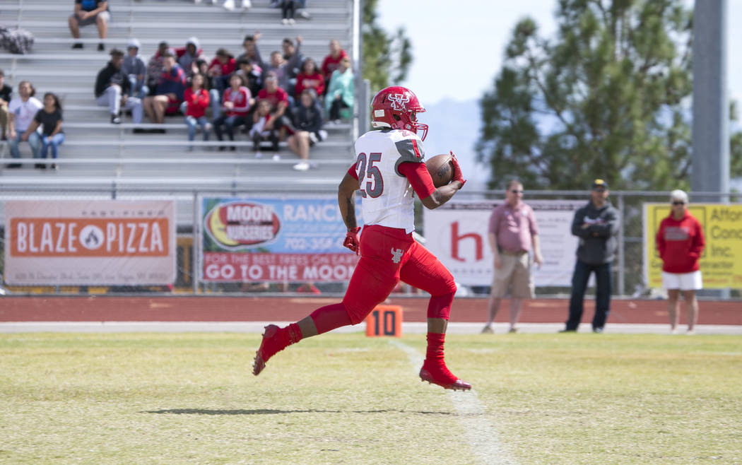 Arbor View's Kyle Graham (25) runs the ball for a touchdown against Shadow Ridge during a football game at Shadow Ridge High School on Saturday, Sept. 23, 2017, in Las Vegas. Richard Brian Las Veg ...
