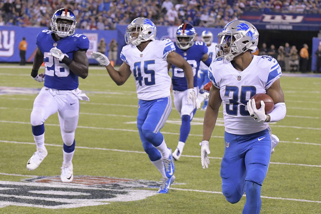 Detroit Lions' Jamal Agnew returns a punt for a touchdown during the second half of an NFL football game against the New York Giants Monday, Sept. 18, 2017, in East Rutherford, N.J. (AP Photo/Juli ...