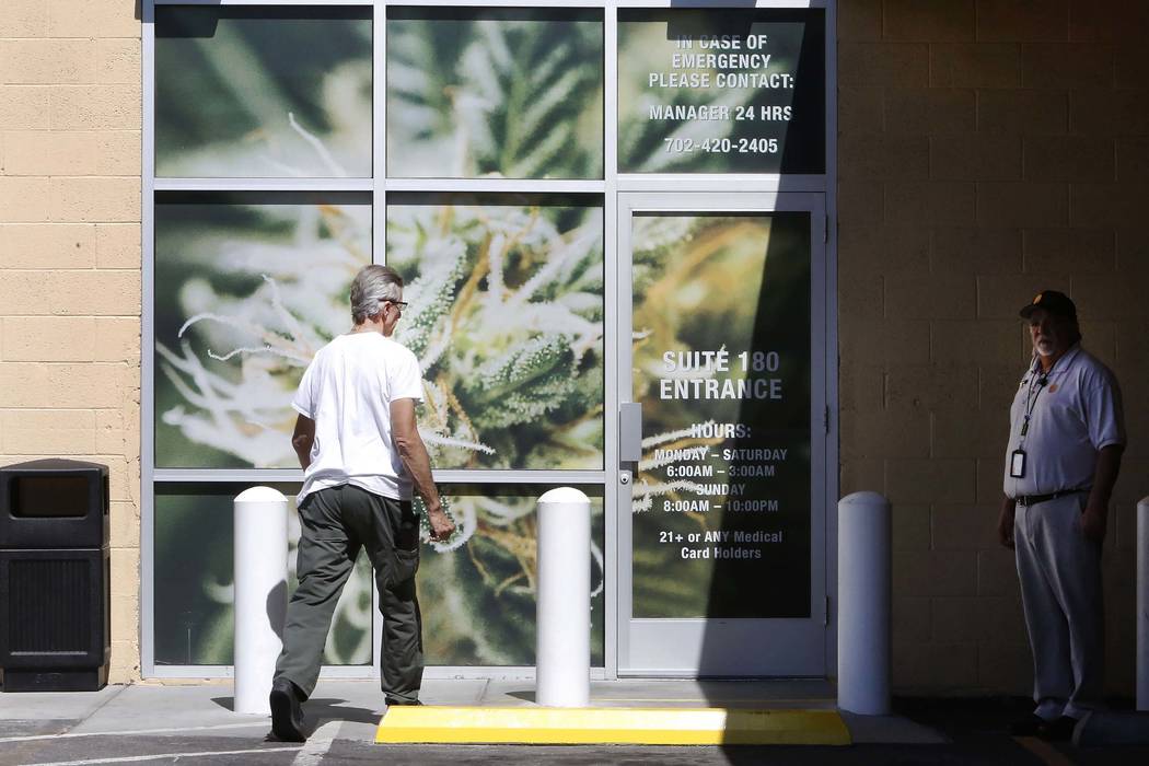 A customer enters Oasis Cannabis Dispensary at 1800 S. Industrial Rd. on Wednesday, Sept. 20, 2017, in Las Vegas. Oasis Cannabis is primed to be the first 24/7 marijuana dispensary located near th ...