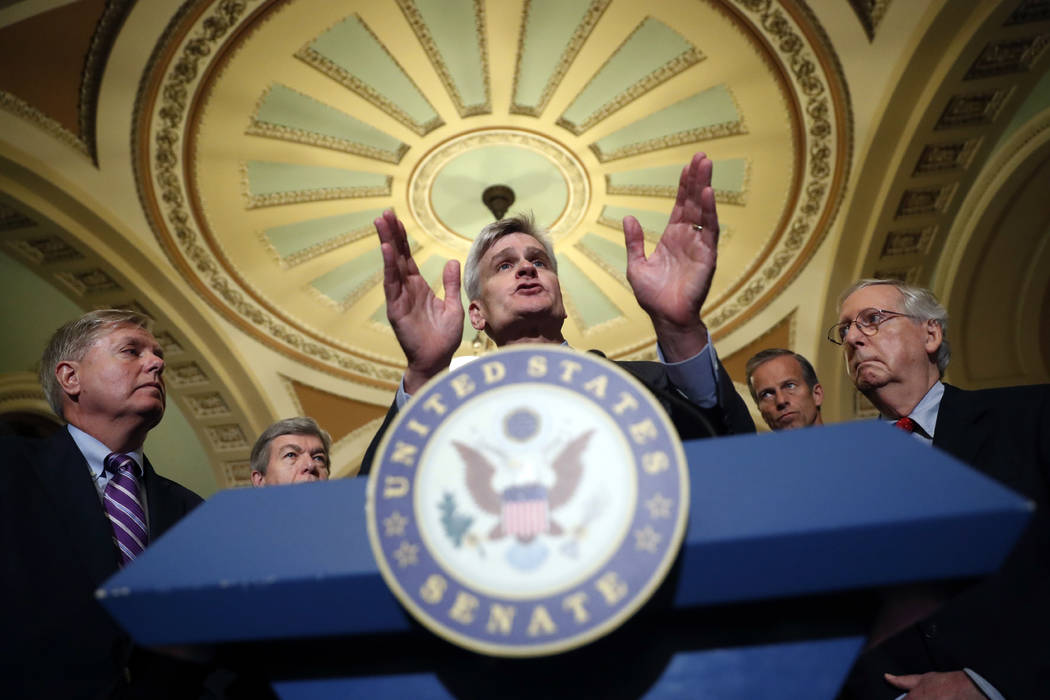 Sen. Bill Cassidy, R-La., center, speaks to the media, accompanied by Sen. Lindsey Graham, R-S.C., left, Sen. Roy Blunt, R-Mo., Sen. John Thune, R-S.D., and Senate Majority Leader Mitch McConnell ...