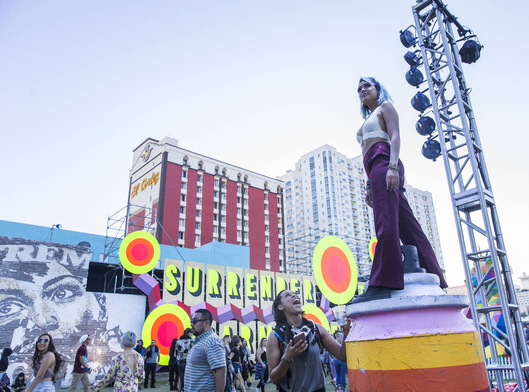 Shayla Raya, right, stands on a pilar outside the Meow Wolf Art Motel during the final day of the Life is Beautiful music and arts festival on Sunday, September 24, 2017, in Las Vegas. Benjamin Ha ...