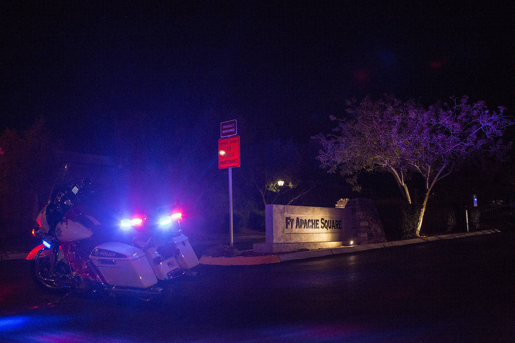 Officers are present in a northwest gated neighborhood near the intersection of North Fort Apache Road and West Grand Teton Drive on Thursday, Sept. 21, 2017, in Las Vegas.  Bridget Bennett Las Ve ...