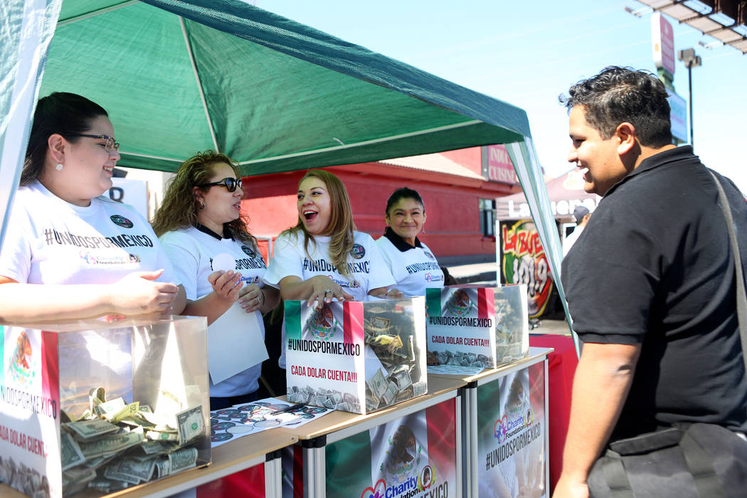 Donations are collected during a Marianaճ Charity Foundation benefit for earthquake victims in Mexico supported by the Latin Chamber of Commerce at Mariana's Supermarket on West Sahara Avenu ...