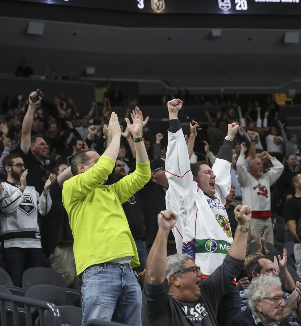 Golden Knights fans celebrate a goal by Golden Knights' William Carrier (28), not pictured, during an NHL preseason hockey game against the Los Angeles Kings at T-Mobile Arena in Las Vegas on Tues ...
