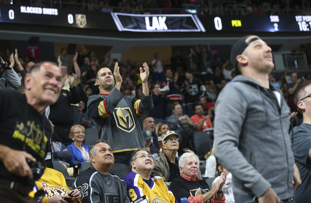 Golden Knights fans cheer after a goal against the Los Angeles Kings during an NHL preseason hockey game at T-Mobile Arena in Las Vegas on Tuesday, Sept. 26, 2017. The Kings won 3-2 in overtime. C ...