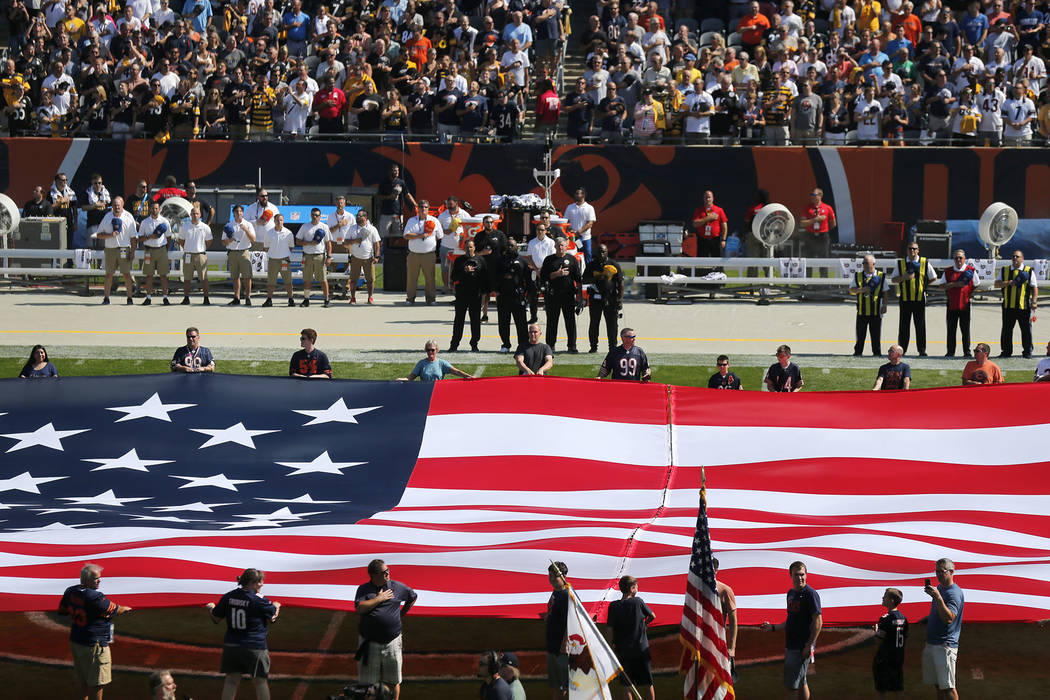 The Pittsburgh Steelers side of the field is nearly empty during the playing of the national anthem before an NFL football game between the Steelers and Chicago Bears, Sunday, Sept. 24, 2017, in C ...