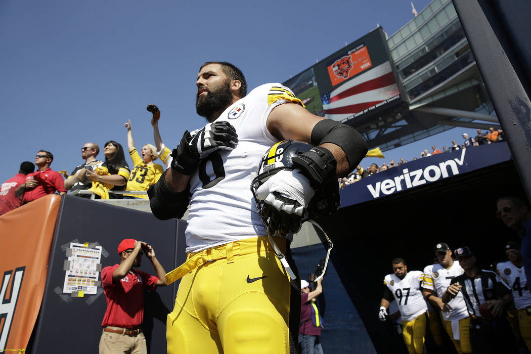 Pittsburgh Steelers offensive tackle and former Army Ranger Alejandro Villanueva (78) stands outside the tunnel alone during the national anthem before an NFL football game against the Chicago Bea ...