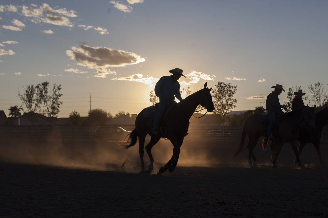Riders take their horses for laps while waiting for the arena to be ready at the Bighorn Rodeo at Horseman's Park in Las Vegas, Saturday, Sept. 23, 2017. The rodeo is put on by the Nevada Gay Rode ...