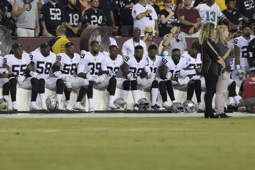 interlocked arms national anthem nfl interlocked arms national anthem nfl