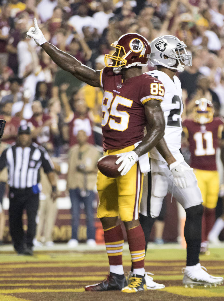 Washington Redskins tight end Vernon Davis (85) celebrates a touchdown in the first half of their game against the Oakland Raiders in Landover, Md., Sunday, Sept. 24, 2017. Heidi Fang Las Vegas Re ...