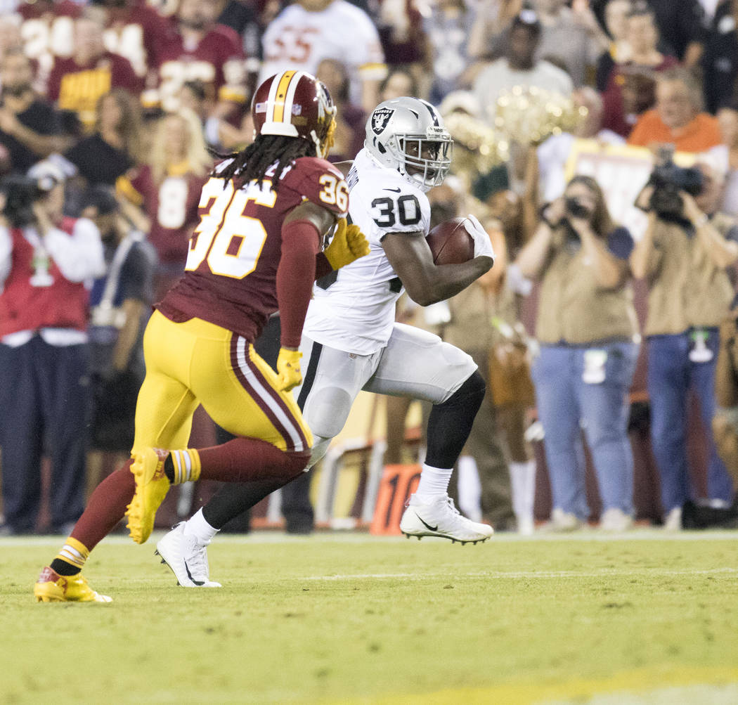 Oakland Raiders running back Jalen Richard (30) carries the football in the first half of their game against the Washington Redskins in Landover, Md., Sunday, Sept. 24, 2017. Heidi Fang Las Vegas ...