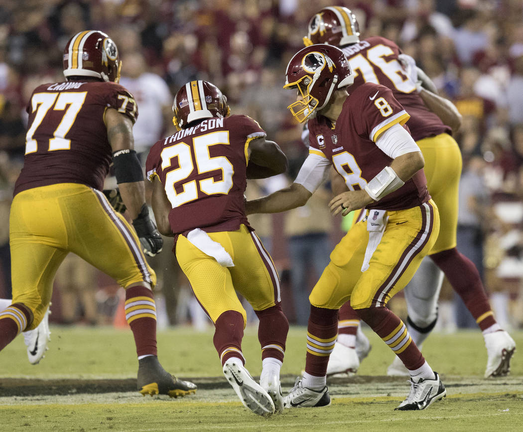 Washington Redskins running back Chris Thompson (25) carries the football in the first half of their game against the Oakland Raiders in Landover, Md., Sunday, Sept. 24, 2017. Heidi Fang Las Vegas ...