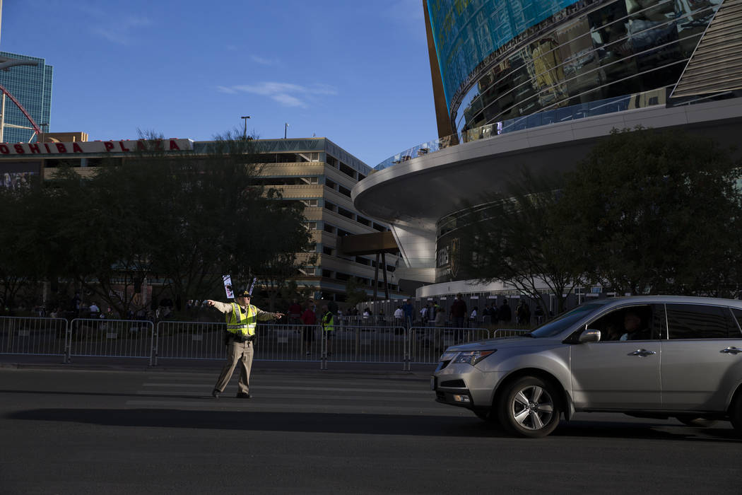 A Las Vegas police officer directs traffic before the first preseason home game for the Vegas Golden Knights at T-Mobile Arena in Las Vegas, Tuesday, Sept. 26, 2017. Erik Verduzco Las Vegas Review ...