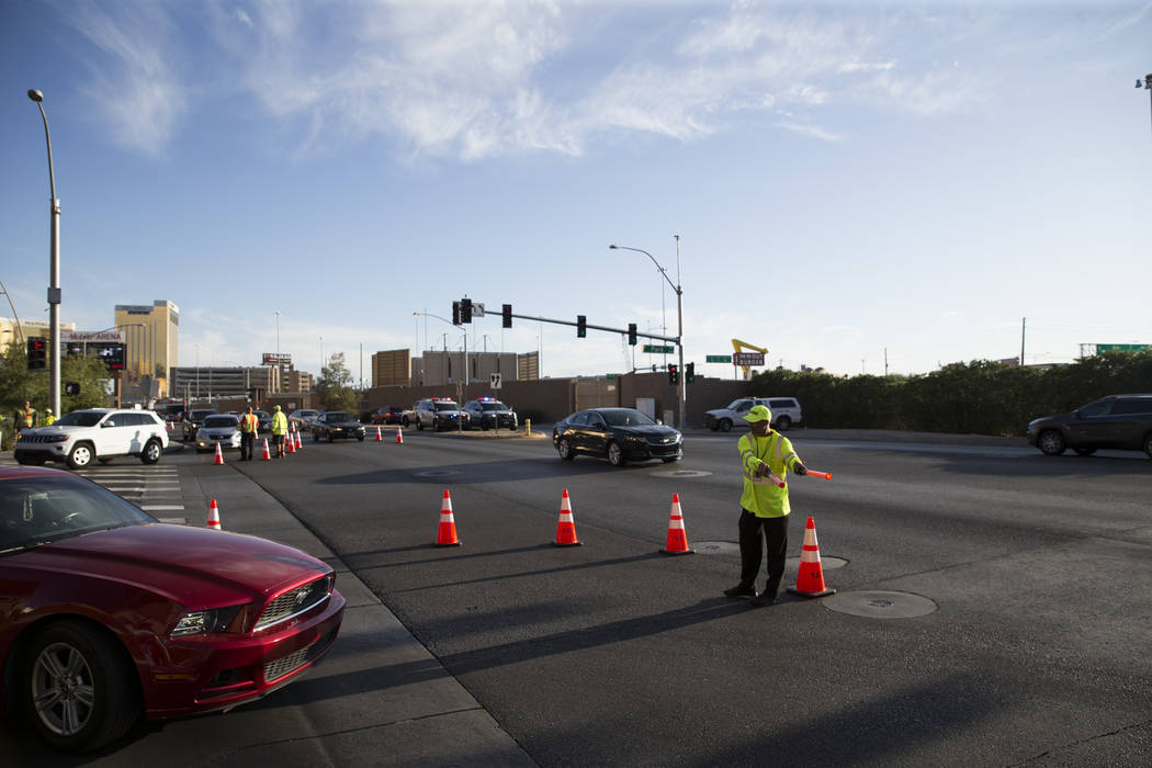 A traffic guard directs vehicles before the first preseason home game for the Vegas Golden Knights at T-Mobile Arena in Las Vegas, Tuesday, Sept. 26, 2017. Erik Verduzco Las Vegas Review-Journal @ ...