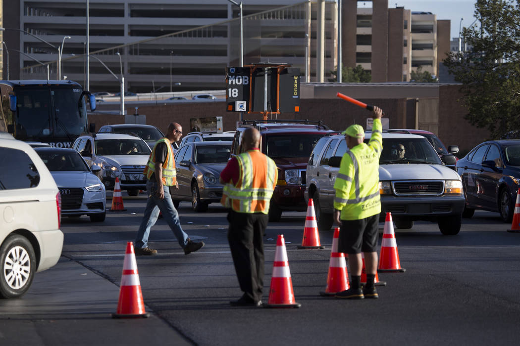 Traffic guards direct vehicles before the first preseason home game for the Vegas Golden Knights at T-Mobile Arena in Las Vegas, Tuesday, Sept. 26, 2017. Erik Verduzco Las Vegas Review-Journal @Er ...