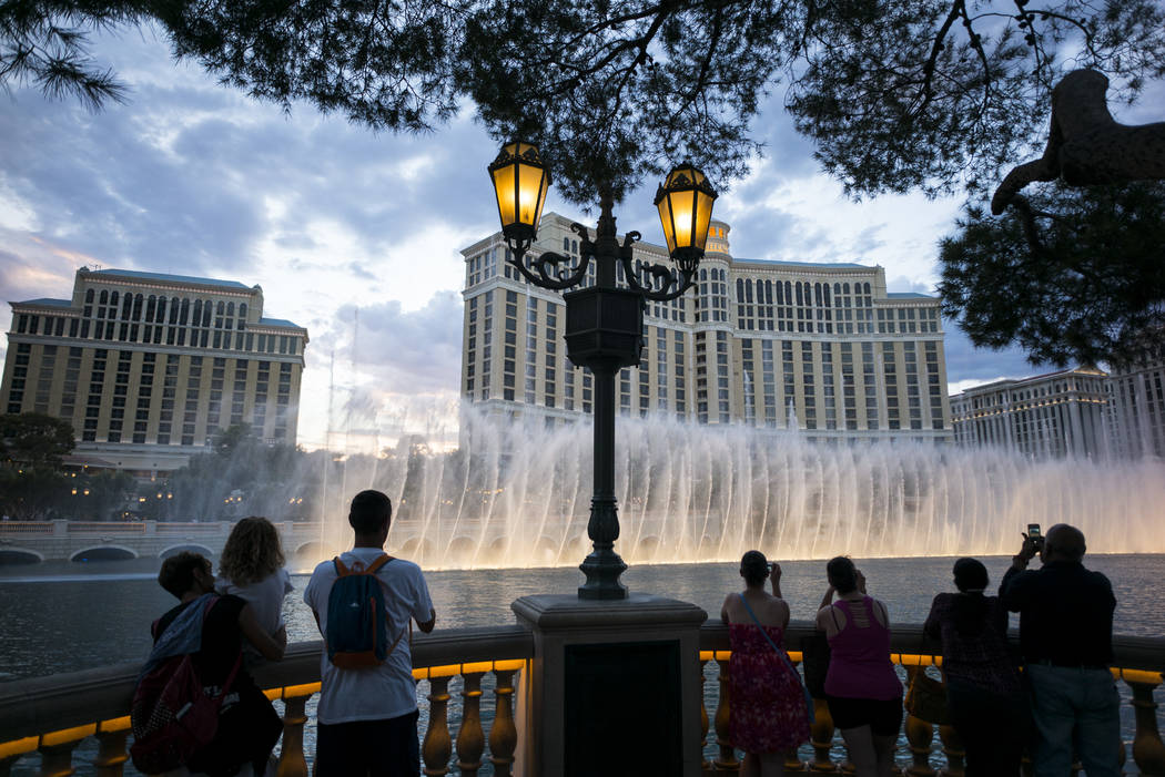 Tourists take in the fountains at the Bellagio on the Las Vegas Strip on Wednesday, Aug. 30, 2017. Chase Stevens Las Vegas Review-Journal @csstevensphoto