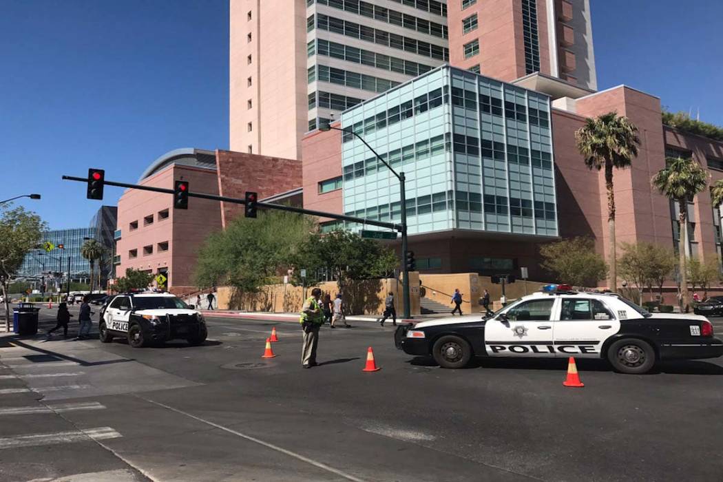 Las Vegas police investigate near the Regional Justice Center in downtown Las Vegas on Monday, Sept. 25, 2017. (Rachel Crosby/Las Vegas Review-Journal)