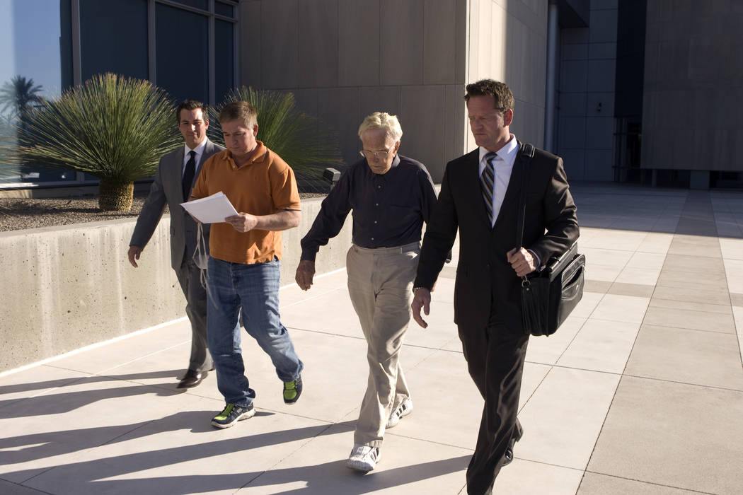 Dr. Henri Wetselaar, second from right, leaves the Lloyd George U.S. Courthouse in September 2011 with his attorney, Robert Draskovich, right. Wetselaar's assistant, David Litwin, second from left ...