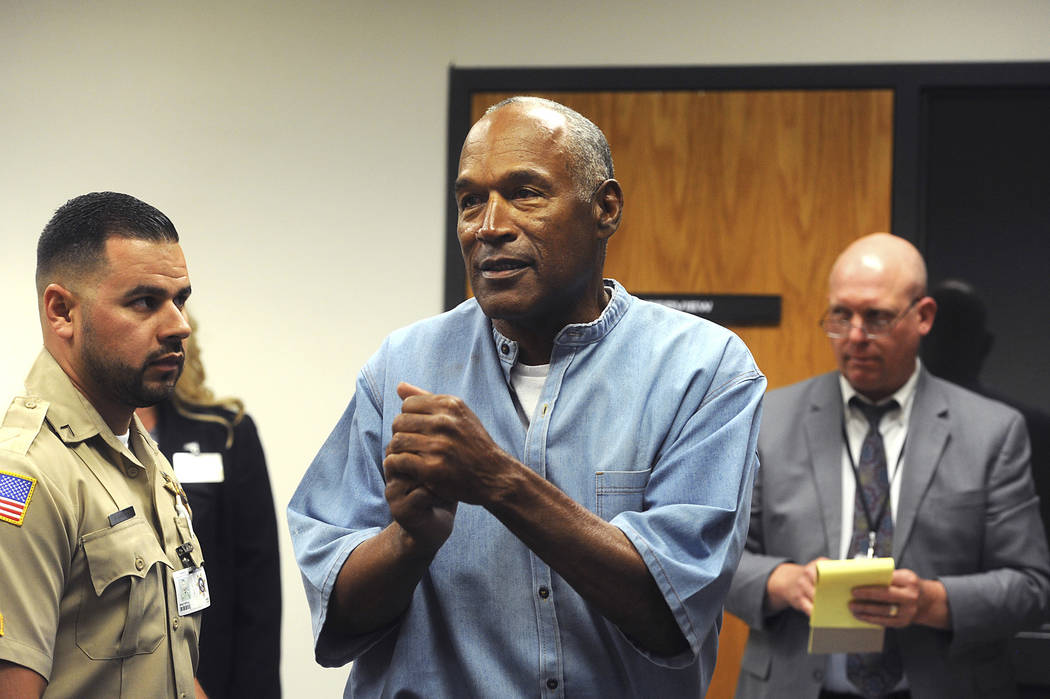 Former NFL football star O.J. Simpson reacts after learning he was granted parole at Lovelock Correctional Center in Nevada on Thursday, July 20, 2017. (Jason Bean/The Reno Gazette-Journal via AP, ...