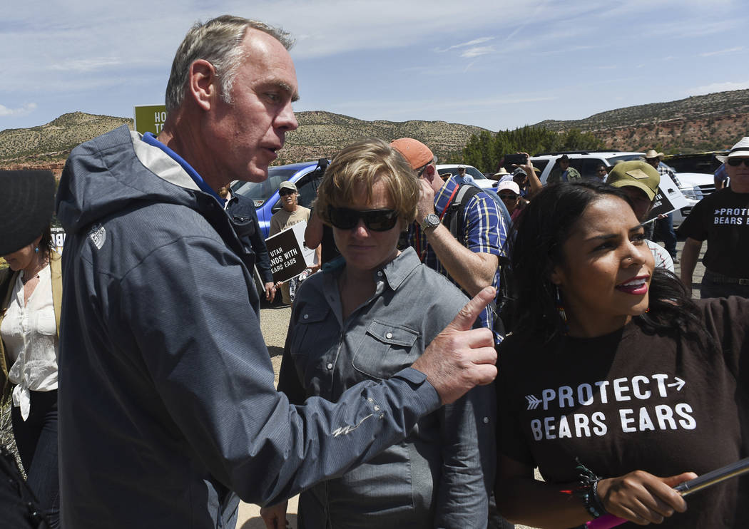 Interior Secretary Ryan Zinke argues with pro monument activist Cassandra Begay on May 8, 2017, after she directed pointed questions regarding his failure to meet with more Native Americans during ...