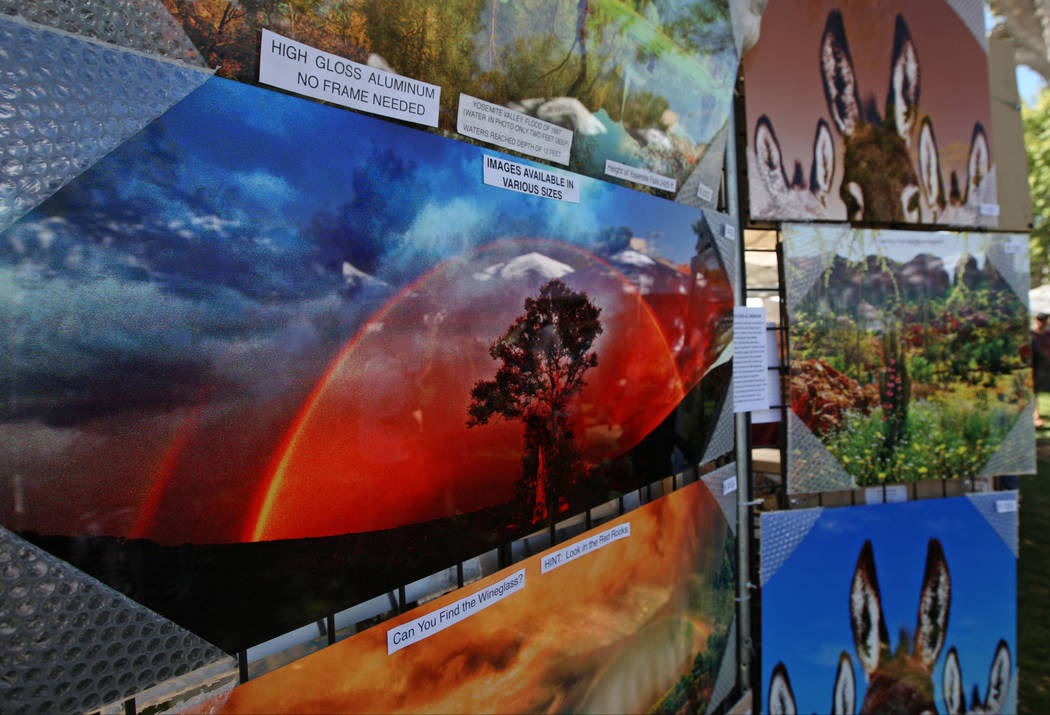 Don Schimmel's photographs printed on high gloss aluminum on display during the Art in the Park festival in Boulder City, Saturday, Oct. 7, 2017. Gabriella Benavidez Las Vegas Review-Journal @lati ...