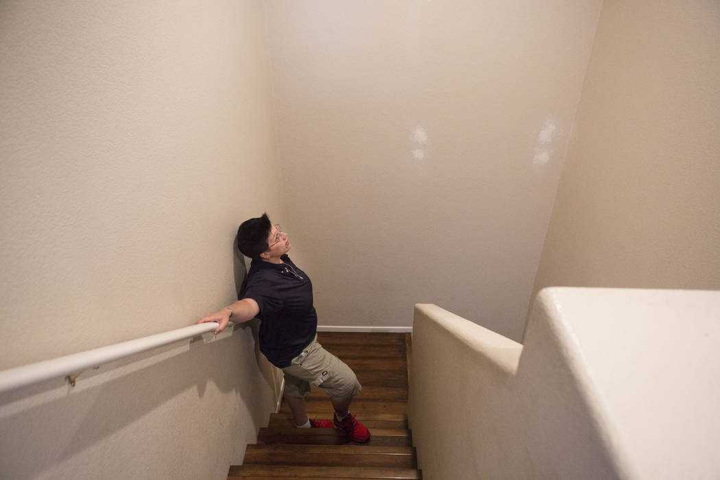 Sarah DePalo looks at the walls in progress of being painted of her and her husband's recently purchased home in Las Vegas, Monday, Sept. 25, 2017. (Elizabeth Brumley/Las Vegas Review-Journal)