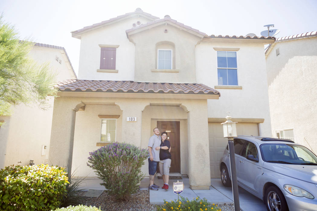 Mike and Sarah DePalo in front of their recently purchased home in Las Vegas, Monday, Sept. 25, 2017. (Elizabeth Brumley/Las Vegas Review-Journal)