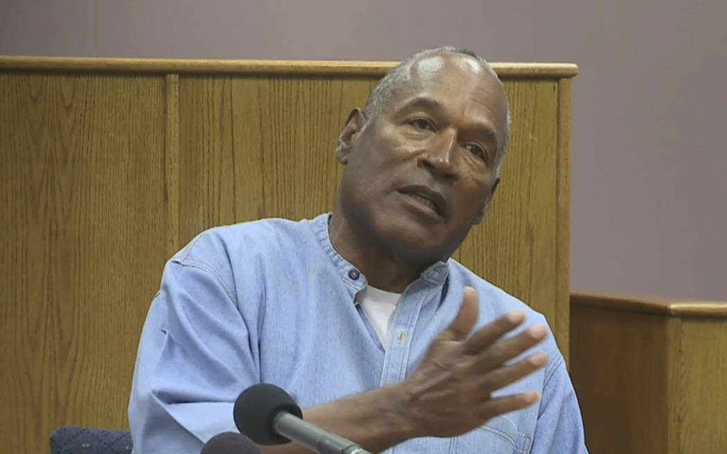 Former NFL football star O.J. Simpson appears via video for his parole hearing at the Lovelock Correctional Center on Thursday, July 20, 2017.  Simpson was convicted in 2008 of enlisting some men  ...