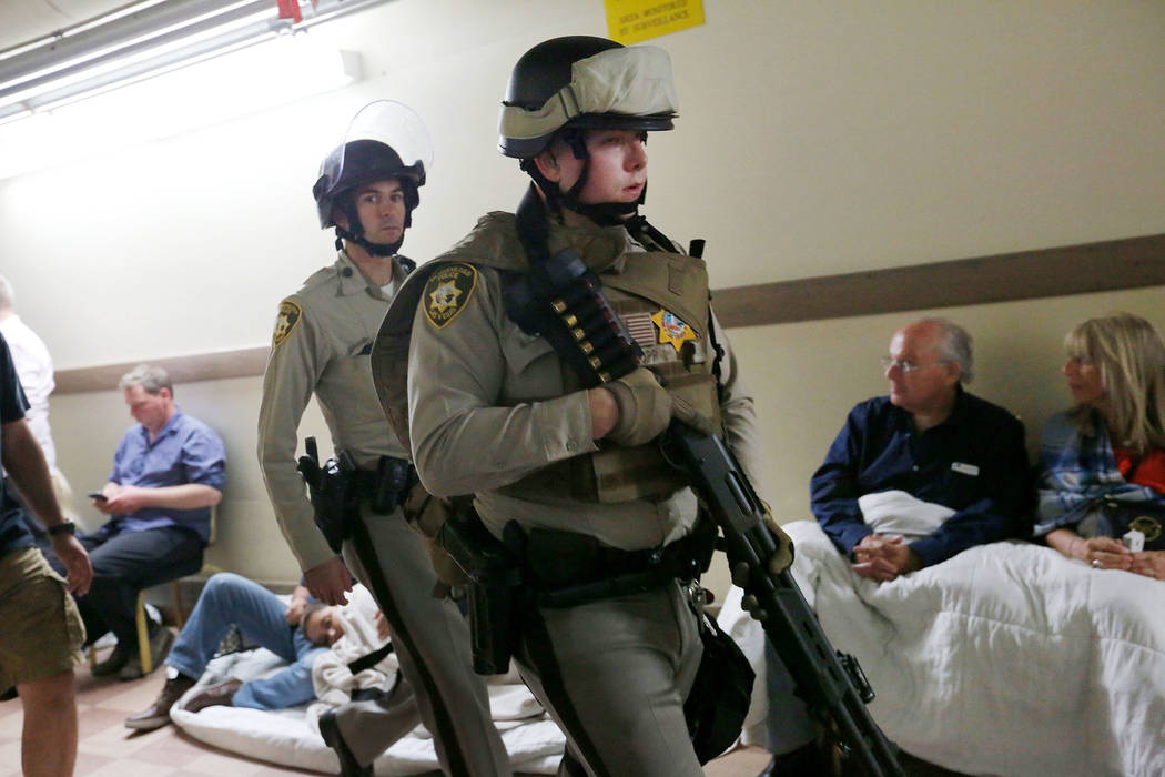 Police officers walk through the Luxor where people have been evacuated during a shooting on the Strip on Sunday, Oct. 1, 2017, in Las Vegas. Chitose Suzuki Las Vegas Review-Journal