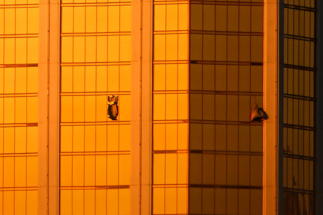 Windows from Mandalay Bay are broken after a shooting occurred leaving at least 50 dead and 200 injured in Las Vegas, Monday, Oct. 2, 2017. Joel Angel Juarez Las Vegas Review-Journal @jajuarezphoto