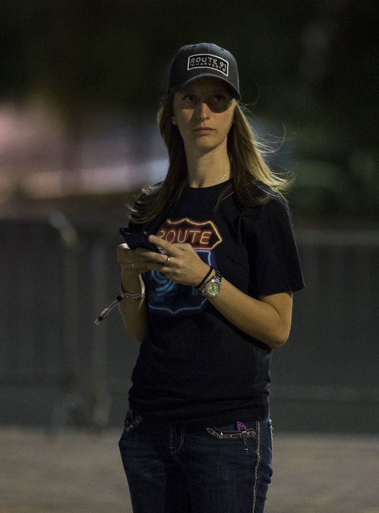Festival-goers attending the Route 91 Harvest Festival were evacuated to the Thomas and Mack Arena early Monday, Oct. 2, 2017, following a shooting situation on the Las Vegas Strip. Richard Brian  ...